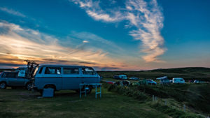 Campers vehicles at sunset