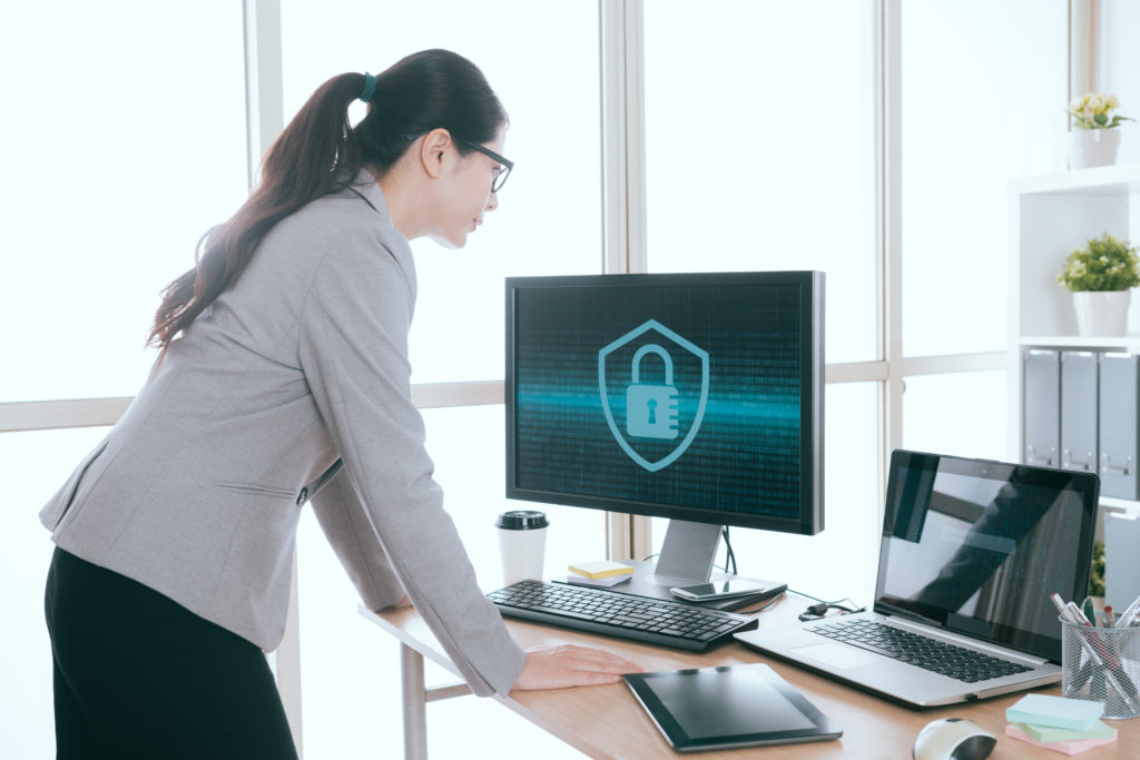 Cyber security agent looking at a desktop